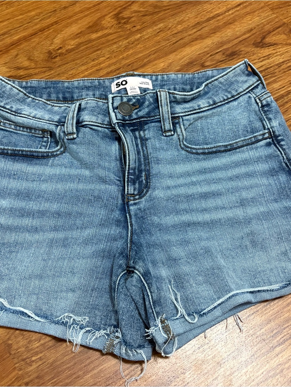 SO Light Blue Distressed Low Rise Midi Denim Shorts